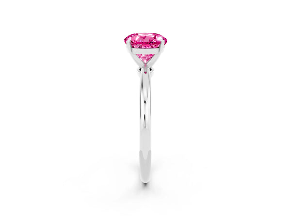 Silver Round Cut Pink Sapphire Solitaire Ring with Six-Prong Setting and Classic Band