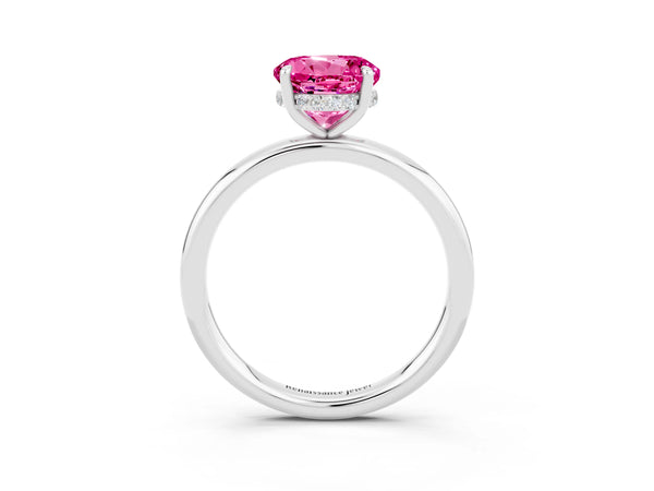 Platinum Round Cut Pink Sapphire Solitaire Ring with Thin Band and Four-Prong Setting