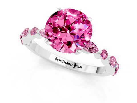 White gold Round Cut Pink Sapphire Solitaire with Side Stones on a Pavé Band and Four-Prong Setting_1
