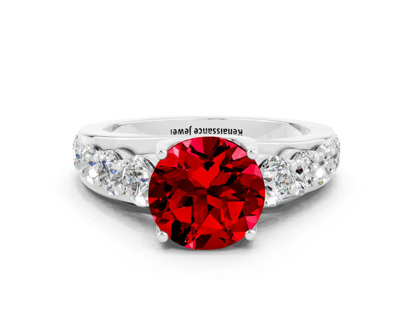 Silver Round Cut Ruby Engagement Ring with Pavé Band and Four-Prong Setting