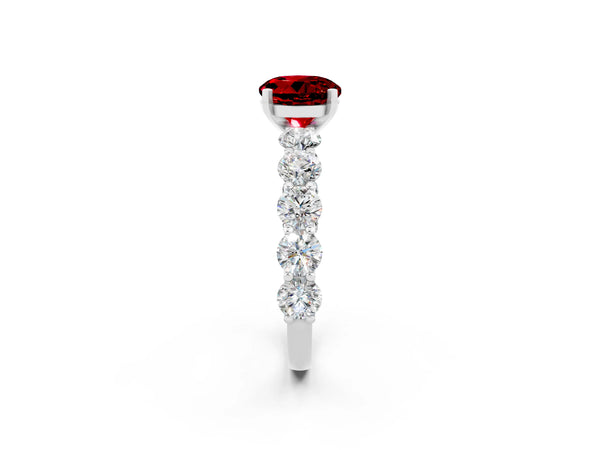Platinum Round Cut Ruby Prong Setting with Side Stones on a Pave Band