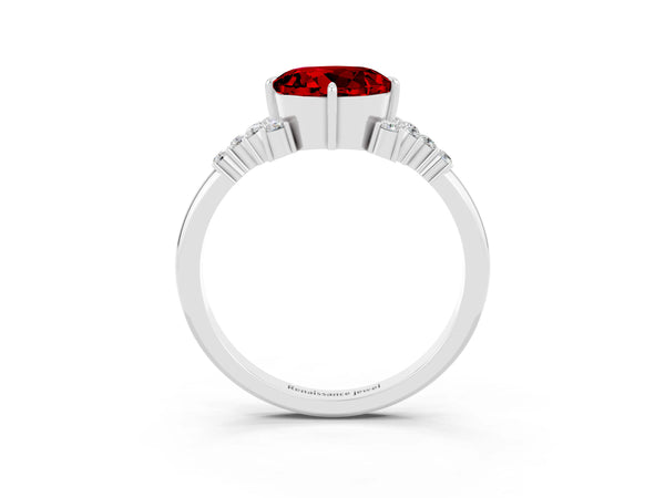 Silver Round Cut Ruby Ring with Side Stones and Four-Prong Setting