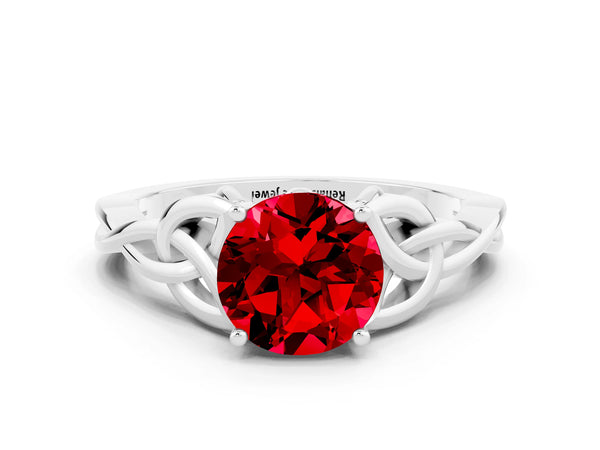 White gold Round Cut Ruby Solitaire Celtic Knot Ring with Four-Prong Setting