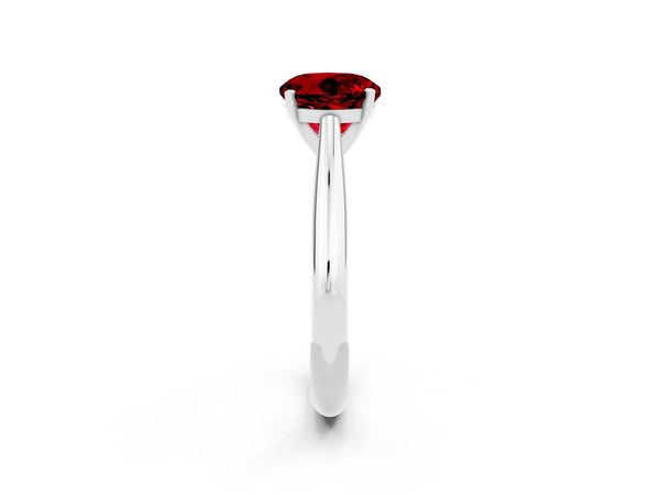 White gold Round Cut Ruby Solitaire Engagement Ring with Cathedral Setting and Four-Prong Mount
