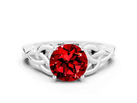 White gold Round Cut Ruby Solitaire Engagement Ring with Celtic Knot Band and Four-Prong Setting