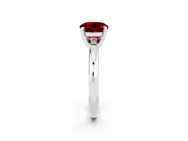 Platinum Round Cut Ruby Solitaire Engagement Ring with Round Band and Four-Prong Setting