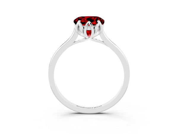 Platinum Round Cut Ruby Solitaire Ring with Flower Prong Setting and Classic Band