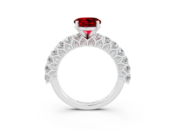 Platinum Round Cut Ruby Solitaire Ring with Shared Prong Pavé Band and Four-Prong Setting