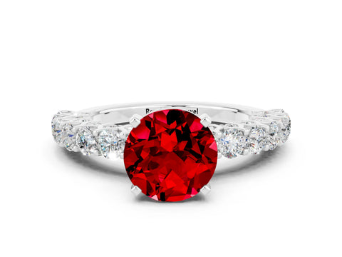 White gold Round Cut Ruby Solitaire Ring with Shared Prong Pavé Band and Four-Prong Setting