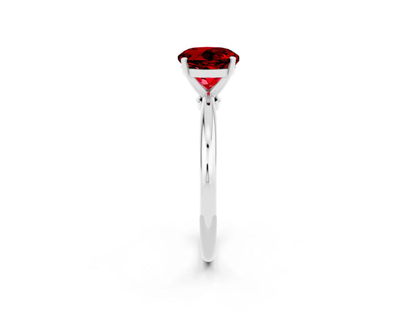 Silver Round Cut Ruby Solitaire Ring with Six-Prong Setting and Classic Band