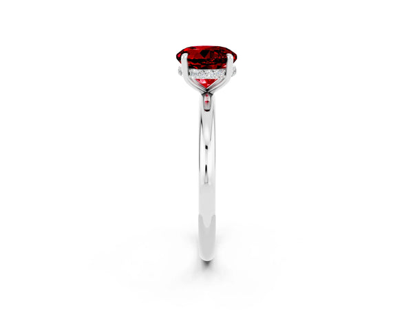Platinum Round Cut Ruby Solitaire Ring with Thin Band and Four-Prong Setting