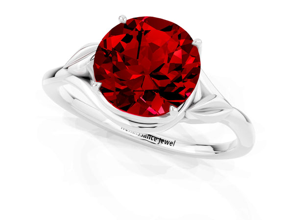Silver Round Cut Ruby Solitaire Ring with Twist Band and Four-Prong Setting