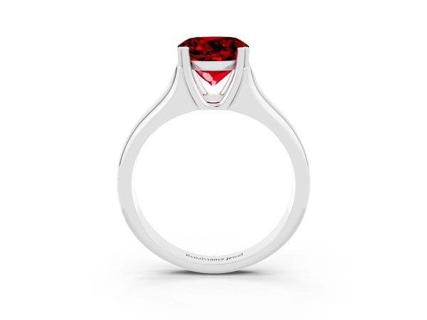 Silver Round Cut Ruby Solitaire Ring with Wide Band and Prong Setting