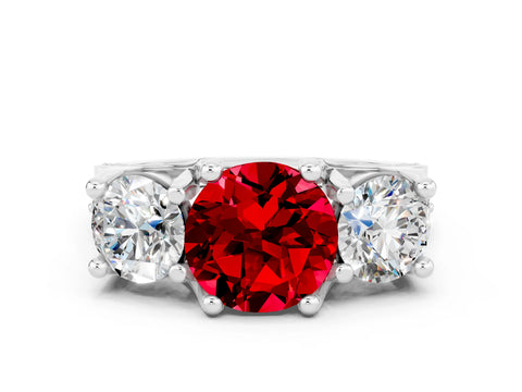 White gold Round Cut Ruby Three-Stone Ring with Channel Set Band and Four-Prong Setting