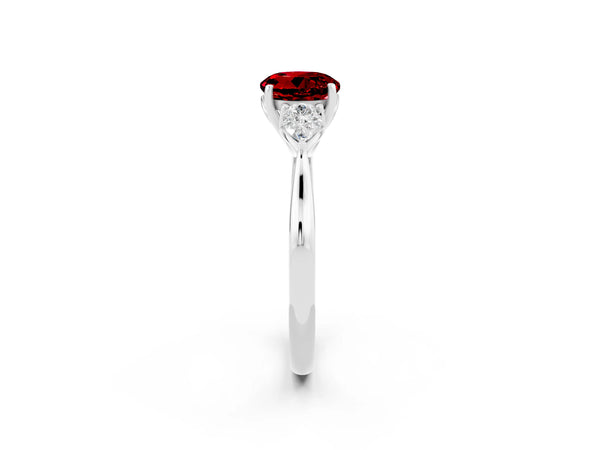 Platinum Round Cut Ruby Three-Stone Ring with Pear  Side Stones and Prong Setting