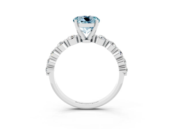 Platinum Round Cut Solitaire Aquamarine Ring with Pave Band and Four-Prong Setting