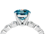 White gold Round Cut Solitaire Blue Topaz Ring with Pave Band and Four-Prong Setting_4