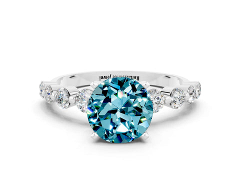 White gold Round Cut Solitaire Blue Topaz Ring with Pave Band and Four-Prong Setting