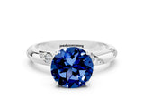 White gold Round Cut Solitaire Diamond Engagement Ring with Twisted Pave Band and Four-Prong Setting