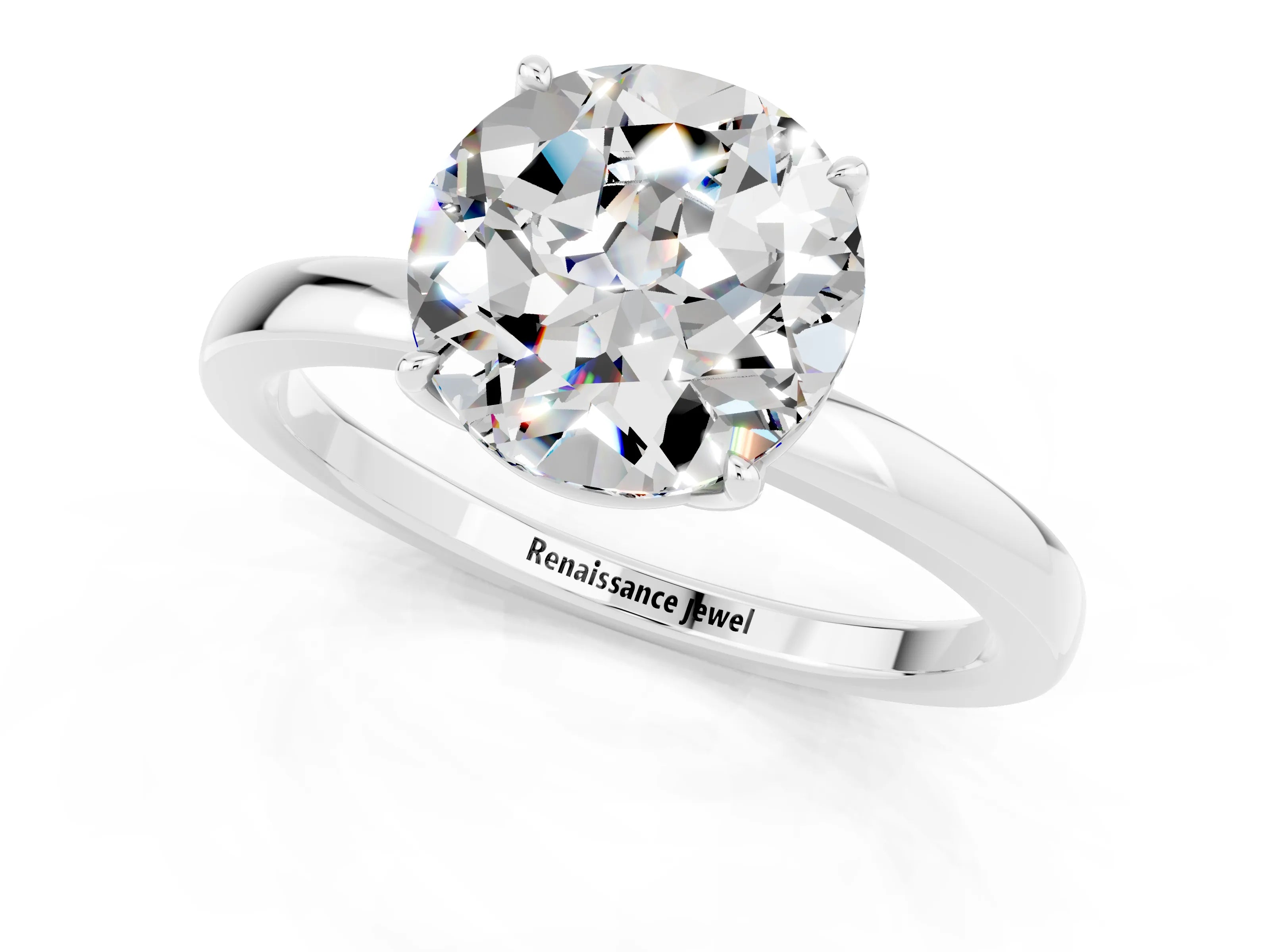 White gold Round Cut Solitaire Diamond Ring with Thin Band and Four-Prong Setting_1