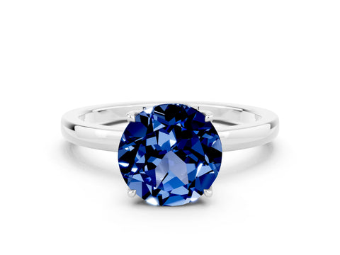 White gold Round Cut Solitaire Diamond Ring with Thin Band and Four-Prong Setting