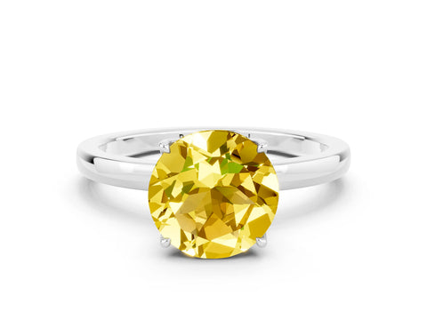 White gold Round Cut Solitaire Diamond Ring with Thin Band and Four-Prong Setting