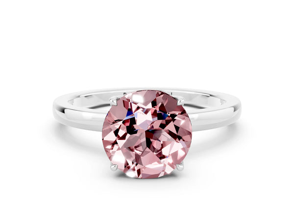 Platinum Round Cut Solitaire Diamond Ring with Thin Band and Four-Prong Setting