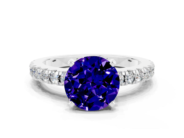 Platinum Round Cut Solitaire Tanzanite with Pavé Band and Four-Prong Setting