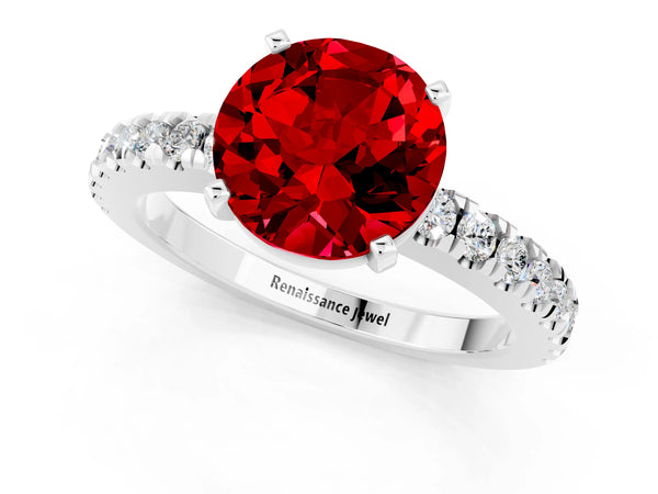 Silver Round Cut Solitaire Ruby with Pavé Band and Four-Prong Setting