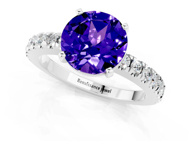 Platinum Round Cut Solitaire Tanzanite with Pavé Band and Four-Prong Setting
