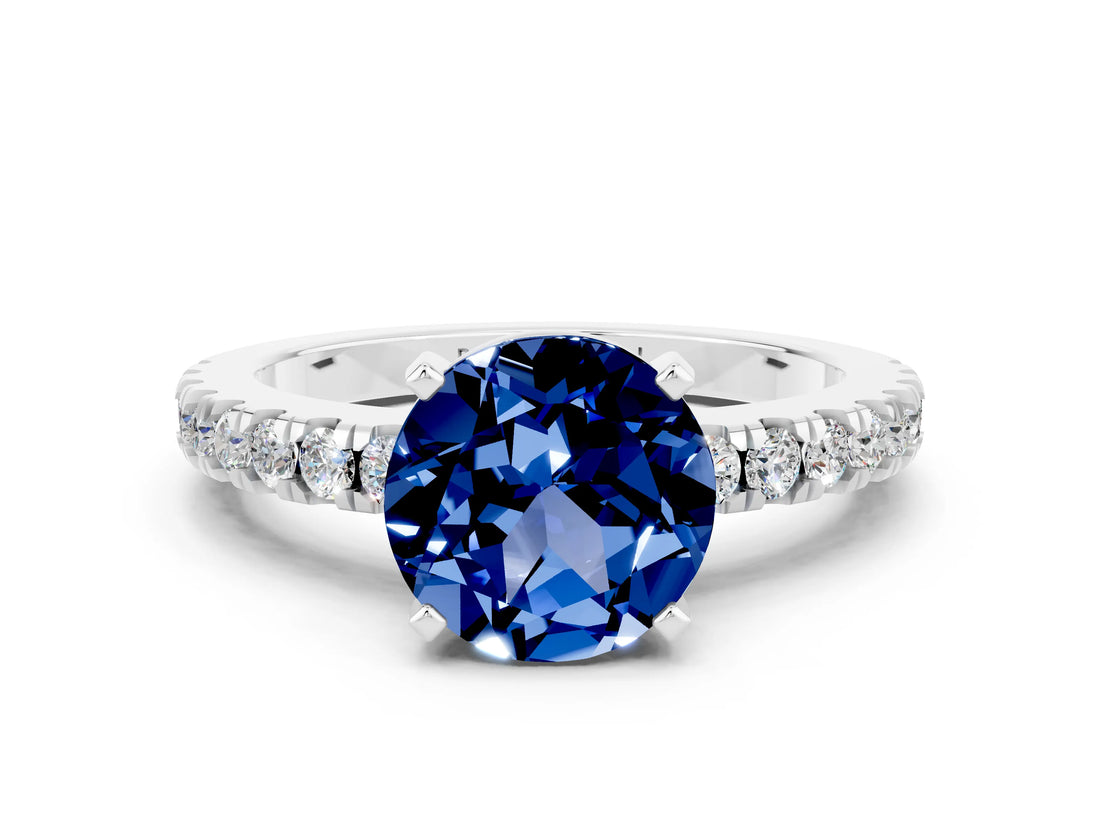 White gold Round Cut Solitaire Diamond with Pavé Band and Four-Prong Setting