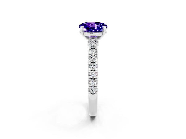 Platinum Round Cut Solitaire Tanzanite with Pavé Band and Four-Prong Setting