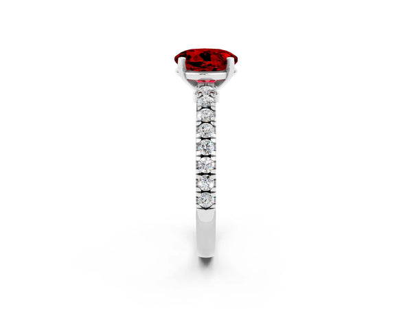 Silver Round Cut Solitaire Ruby with Pavé Band and Four-Prong Setting