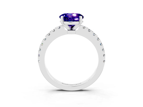Platinum Round Cut Solitaire Tanzanite with Pavé Band and Four-Prong Setting