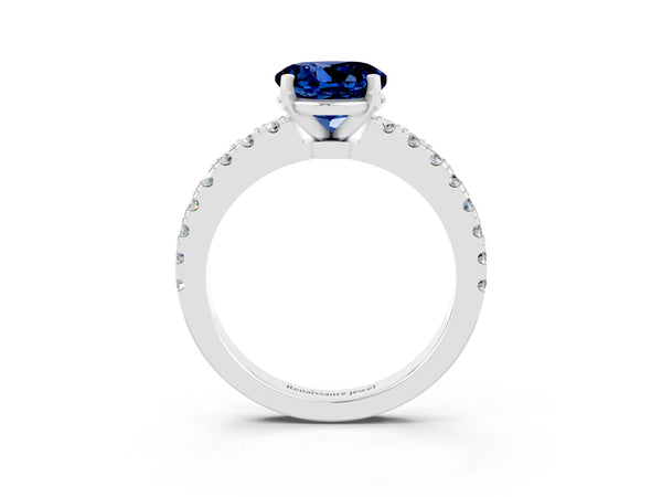 White gold Round Cut Solitaire Blue Sapphire with Pavé Band and Four-Prong Setting