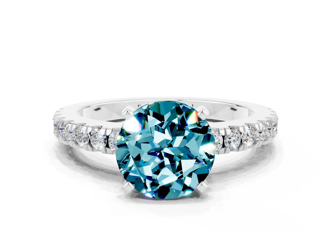 White gold Round Cut Solitaire Diamond with Pavé Band and Four-Prong Setting