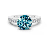 White gold Round Cut Solitaire Diamond with Pavé Band and Four-Prong Setting