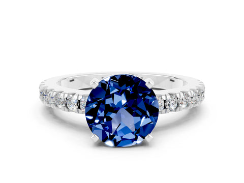 White gold Round Cut Solitaire Diamond with Pavé Band and Four-Prong Setting