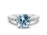 White gold Round Cut Solitaire Diamond with Pavé Band and Four-Prong Setting