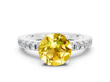 White gold Round Cut Solitaire Diamond with Pavé Band and Four-Prong Setting