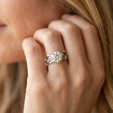 White gold Round Cut Solitaire Diamond with Side Stones on Criss-Cross Band and Four-Prong Setting_15