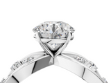 White gold Round Cut Solitaire Diamond with Side Stones on Criss-Cross Band and Four-Prong Setting_27