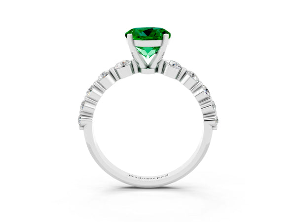 Silver Round Cut Solitaire Emerald Ring with Pave Band and Four-Prong Setting