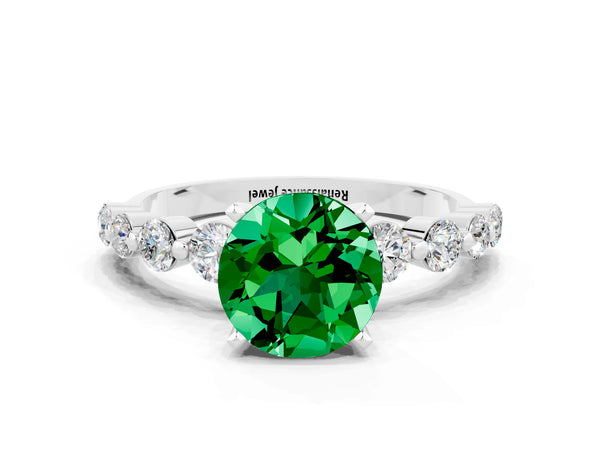 Silver Round Cut Solitaire Emerald Ring with Pave Band and Four-Prong Setting