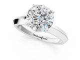 White gold Round Cut Solitaire Engagement Ring with Flat Band and Four-Prong Setting 1