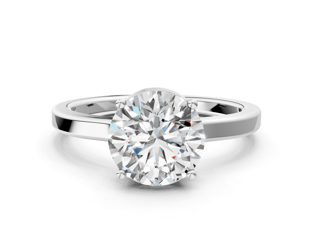 White gold Round Cut Solitaire Engagement Ring with Four-Prong Setting on a Classic Band_57