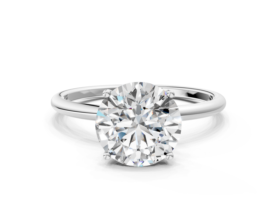 White gold Round Cut Solitaire Engagement Ring with Thin Band and Four-Prong Setting_3