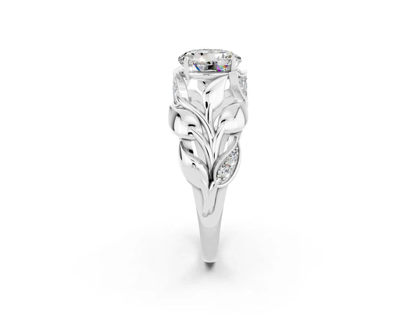 Platinum Round Cut Moissanite Leaf-Inspired Engagement Ring with Round Accents and Prong Setting