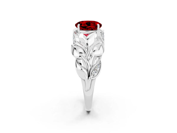 Silver Round Cut Ruby Leaf-Inspired Engagement Ring with Round Accents and Prong Setting