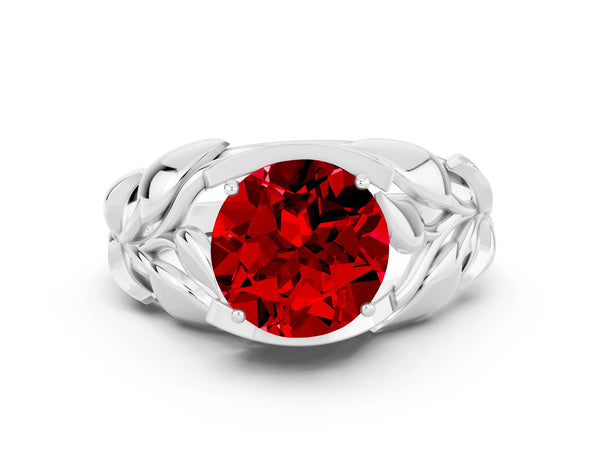 Platinum Round Cut Ruby Leaf-Inspired Engagement Ring with Round Accents and Prong Setting